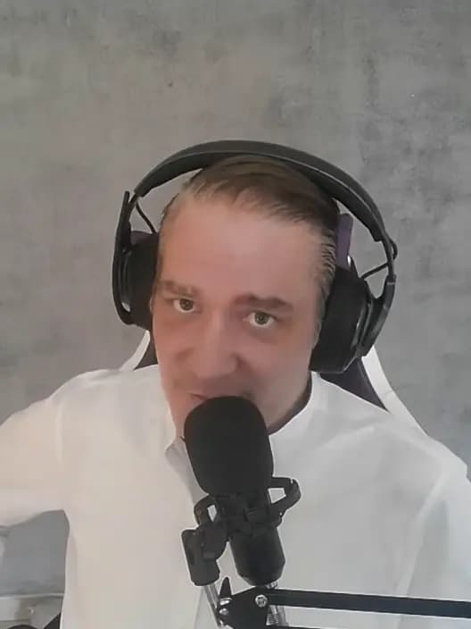 Tommy Honold at his desk with headset and microphone, a still from his Mining Layers tutorial video