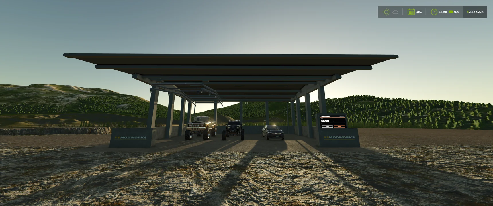 Carport XL from the front: three vehicles under the long solar roof, the pipe frame of the wash portal on the left, the status screen on READY on the right