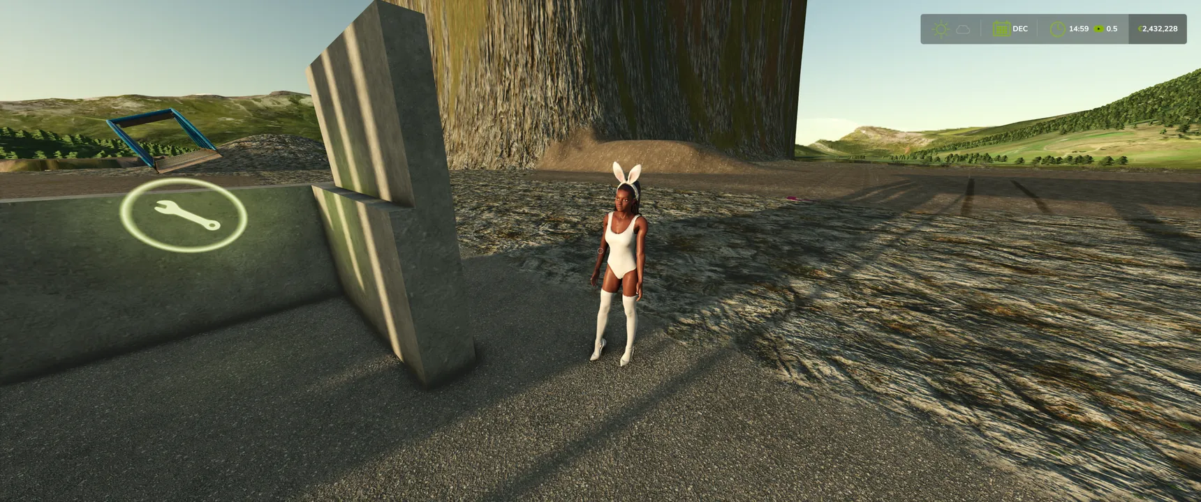 The greeting figure in a white bunny outfit standing outside next to the concrete wall, the workshop marker on the left